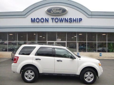 White Suede Ford Escape XLT. Click to enlarge. White Suede Ford Escape XLT. Click to enlarge.