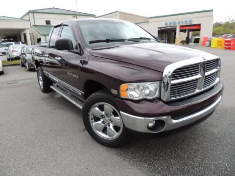 Deep Molten Red Pearl Dodge Ram 1500 Laramie Quad Cab 4x4.  Click to enlarge.