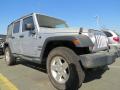 Front 3/4 View of 2012 Jeep Wrangler Unlimited Sport S 4x4 #4