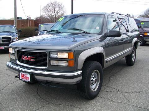 Storm Gray Metallic GMC Suburban K2500 SLT 4x4.  Click to enlarge.