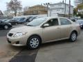 Front 3/4 View of 2010 Toyota Corolla LE #3
