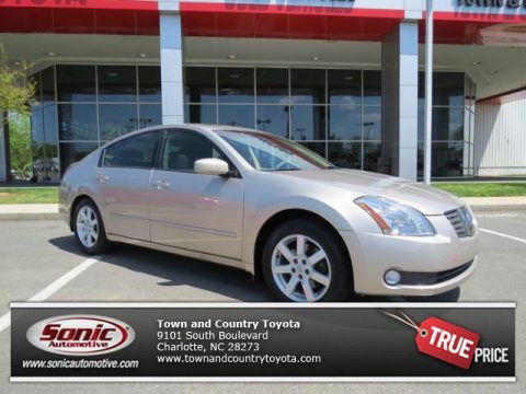 Coral Sand Metallic Nissan Maxima 3.5 SL.  Click to enlarge.