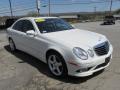 Front 3/4 View of 2009 Mercedes-Benz E 350 4Matic Sedan #10