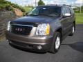Front 3/4 View of 2013 GMC Yukon SLE #1