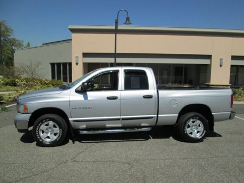 Bright Silver Metallic Dodge Ram 1500 SLT Quad Cab 4x4.  Click to enlarge.