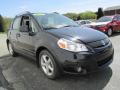 Front 3/4 View of 2009 Suzuki SX4 Crossover Touring AWD #5