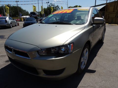 Desert Sand Metallic Mitsubishi Lancer ES. Click to enlarge. Desert Sand Metallic Mitsubishi Lancer ES. Click to enlarge.