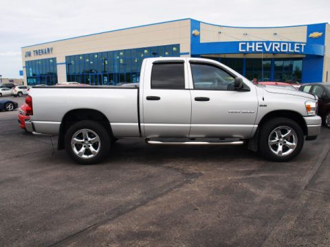 Bright Silver Metallic Dodge Ram 1500 SLT Quad Cab 4x4.  Click to enlarge.