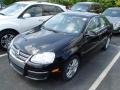 Front 3/4 View of 2009 Volkswagen Jetta TDI Sedan #3