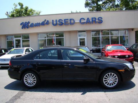 Tuxedo Black Metallic Mercury Milan V6 Premier.  Click to enlarge.