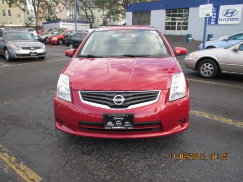 Red Brick Metallic Nissan Sentra 2.0 S.  Click to enlarge.