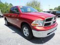 Front 3/4 View of 2010 Dodge Ram 1500 SLT Quad Cab 4x4 #10