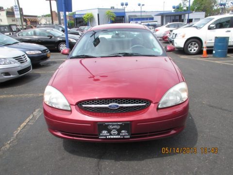 Matador Red Metallic Ford Taurus SE.  Click to enlarge.
