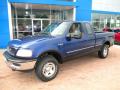 Front 3/4 View of 1997 Ford F150 XLT Extended Cab 4x4 #10