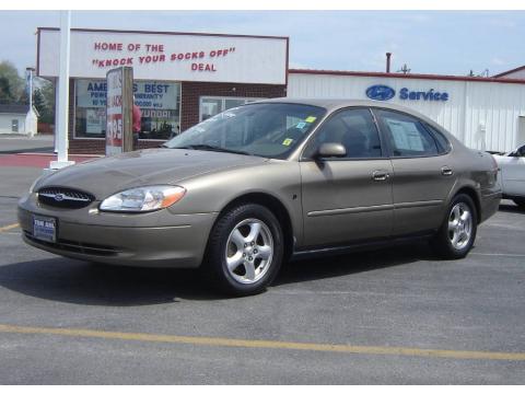 Arizona Beige Metallic Ford Taurus SES.  Click to enlarge.