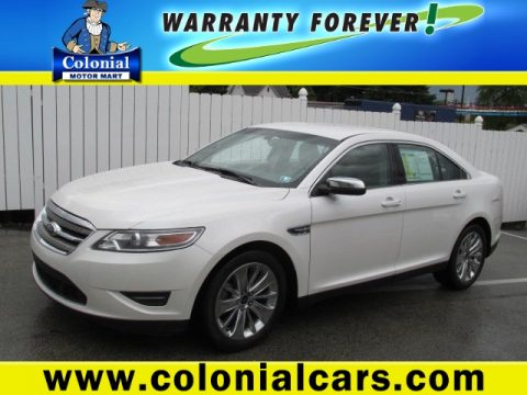 White Suede Metallic Ford Taurus Limited.  Click to enlarge.