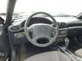 Dashboard of 2000 Pontiac Sunfire SE Sedan #9