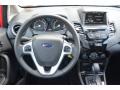 Dashboard of 2014 Ford Fiesta SE Sedan #10