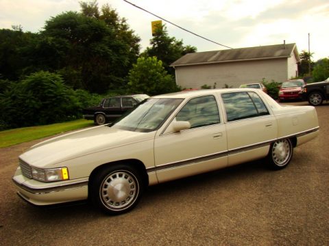 White Cadillac DeVille Sedan.  Click to enlarge.