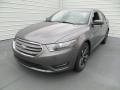 Front 3/4 View of 2014 Ford Taurus SEL #11