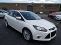 Front 3/4 View of 2014 Ford Focus Titanium Sedan #1