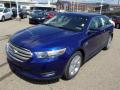 Front 3/4 View of 2014 Ford Taurus SEL #4