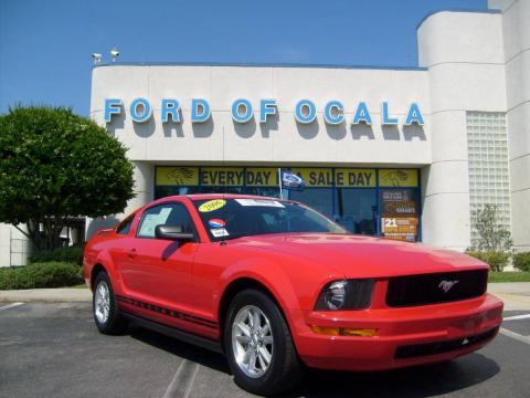 Torch Red Ford Mustang V6 Deluxe Coupe.  Click to enlarge.