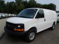 Front 3/4 View of 2014 Chevrolet Express 1500 Cargo WT #2