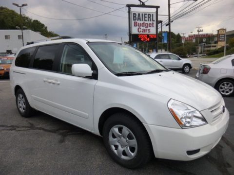 Clear White Kia Sedona LX.  Click to enlarge.