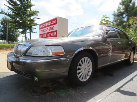 Charcoal Grey Metallic Lincoln Town Car Executive.  Click to enlarge.