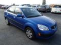 Front 3/4 View of 2009 Kia Rio LX Sedan #4