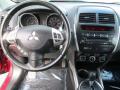 Dashboard of 2013 Mitsubishi Outlander Sport ES #10