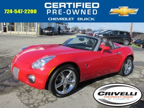Aggressive Red Pontiac Solstice Roadster.  Click to enlarge.
