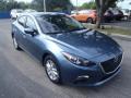 Front 3/4 View of 2014 Mazda MAZDA3 i Touring 4 Door #1 Front 3/4 View of 2014 Mazda MAZDA3 i Touring 4 Door #1