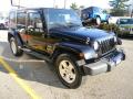 Front 3/4 View of 2008 Jeep Wrangler Unlimited Sahara 4x4 #4