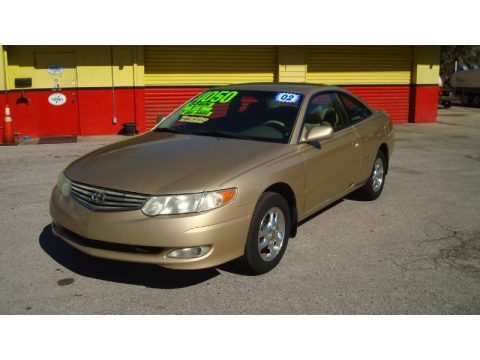 Gold Dust Metallic Toyota Solara SE V6 Coupe.  Click to enlarge.