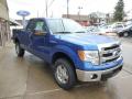 Front 3/4 View of 2014 Ford F150 XLT SuperCab 4x4 #3