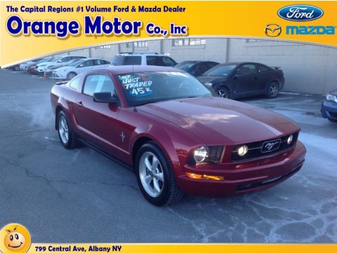Torch Red Ford Mustang V6 Deluxe Coupe.  Click to enlarge.