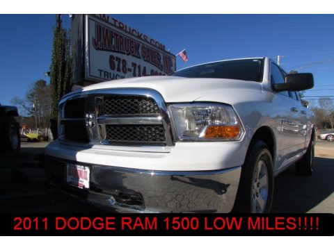 Bright White Dodge Ram 1500 SLT Quad Cab.  Click to enlarge.