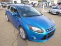 Front 3/4 View of 2014 Ford Focus Titanium Hatchback #2