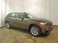 Front 3/4 View of 2013 BMW X1 xDrive 28i #17