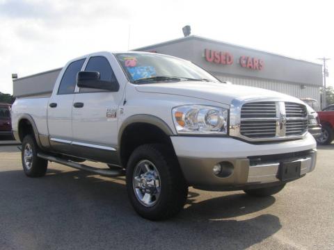 Bright White Dodge Ram 2500 Laramie Quad Cab 4x4.  Click to enlarge.