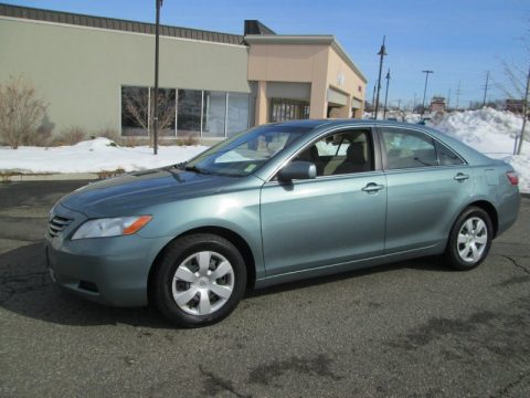 Aloe Green Metallic Toyota Camry LE.  Click to enlarge.