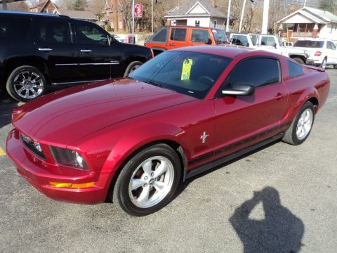 Redfire Metallic Ford Mustang V6 Premium Coupe.  Click to enlarge.