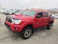 Front 3/4 View of 2012 Toyota Tacoma TX Pro Double Cab 4x4 #6