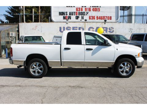 Bright White Dodge Ram 1500 SLT Quad Cab 4x4.  Click to enlarge.