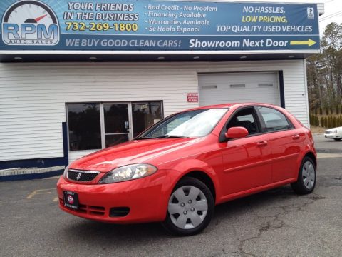 Super Red Suzuki Reno . Click to enlarge. Super Red Suzuki Reno . Click to enlarge.