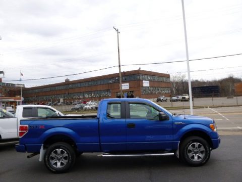 Blue Flame Metallic Ford F150 STX SuperCab 4x4.  Click to enlarge.