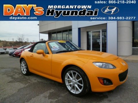 Competition Yellow Mazda MX-5 Miata Grand Touring Roadster.  Click to enlarge.