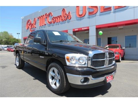 Brilliant Black Crystal Pearl Dodge Ram 1500 SLT Quad Cab.  Click to enlarge.